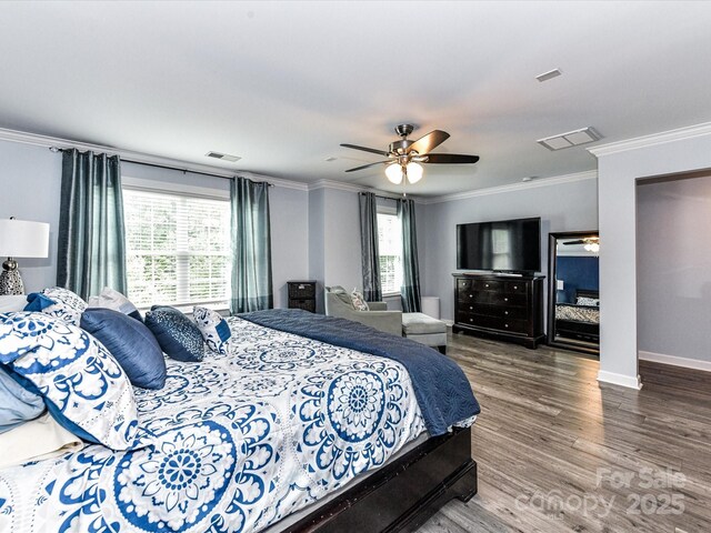 10800 Alabaster Dr, Davidson, NC 28036 - bedroom with multiple windows, crown molding, wood finished floors, a ceiling fan, and baseboards