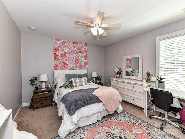 10800 Alabaster Dr, Davidson, NC 28036 - bedroom with light colored carpet, a ceiling fan, a desk, and baseboards