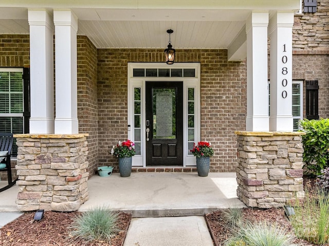 10800 Alabaster Dr, Davidson, NC 28036 - entrance to property with covered porch and brick siding