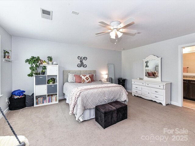 10800 Alabaster Dr, Davidson, NC 28036 - bedroom featuring light colored carpet, ensuite bath, ceiling fan, and baseboards
