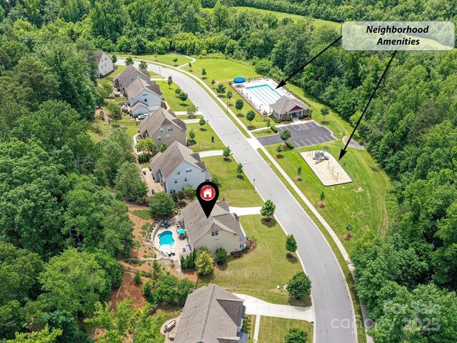 10800 Alabaster Dr, Davidson, NC 28036 - drone / aerial view of a pool and a heavily wooded area