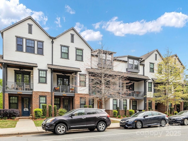 multi unit property featuring brick siding