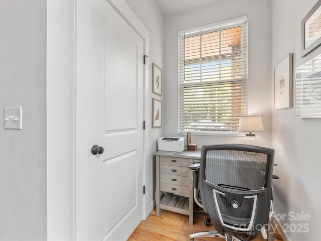 office space with wood finished floors