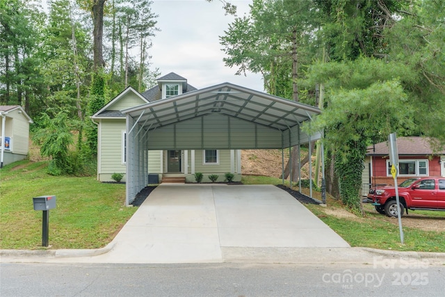 204 Maple Ave, Marion, NC 28752 - view of front of property featuring a detached carport, a front lawn, and concrete driveway