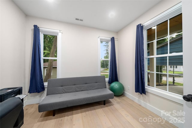 204 Maple Ave, Marion, NC 28752 - sitting room with wood finished floors and baseboards