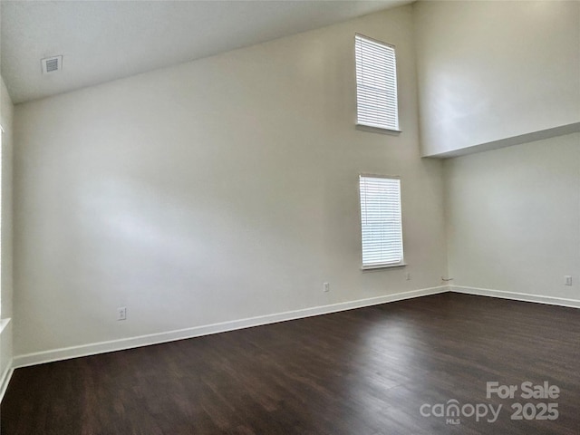 710 Woodington Ln, Charlotte, NC 28214 - unfurnished room featuring dark wood finished floors and baseboards