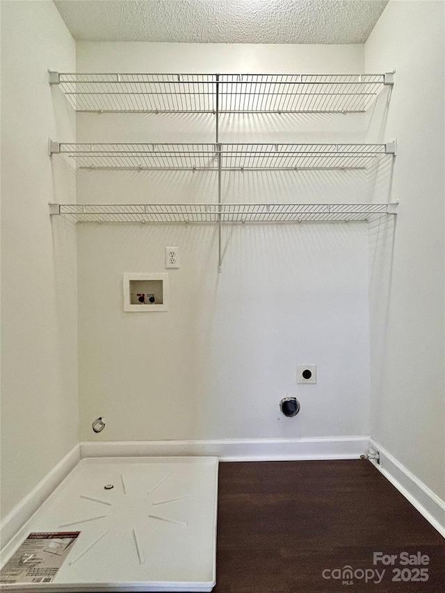 710 Woodington Ln, Charlotte, NC 28214 - laundry room with hookup for an electric dryer, hookup for a washing machine, baseboards, and gas dryer hookup