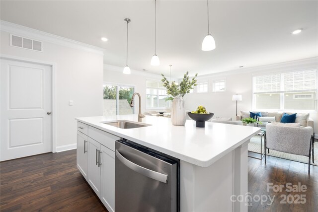 128 S Shayna Rd, Troutman, NC 28166 - kitchen with stainless steel dishwasher, a sink, dark wood finished floors, ornamental molding, and light countertops