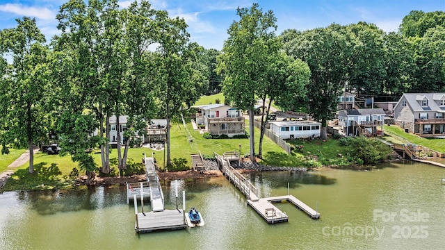 4920 Longfield St, Claremont, NC 28610 - dock area with a water view, a yard, and view of scattered trees