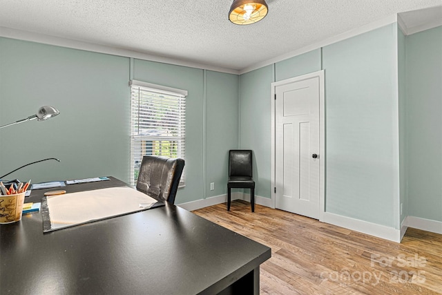 4920 Longfield St, Claremont, NC 28610 - office with light wood-type flooring, a textured ceiling, and baseboards