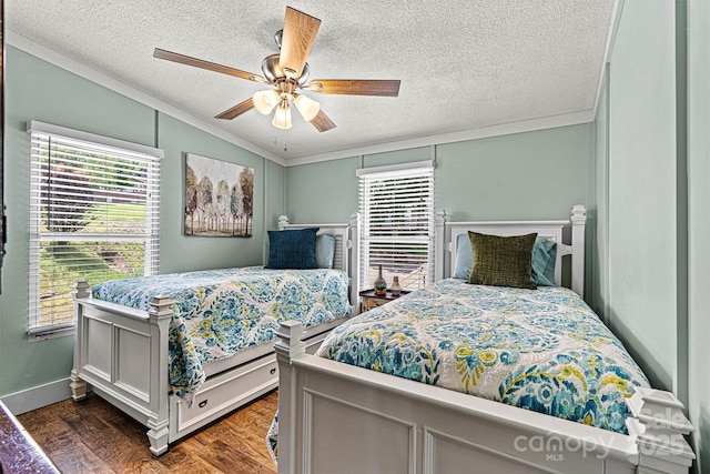 4920 Longfield St, Claremont, NC 28610 - bedroom featuring lofted ceiling, a textured ceiling, wood finished floors, multiple windows, and ceiling fan
