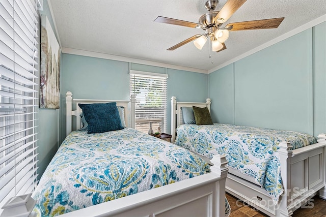 4920 Longfield St, Claremont, NC 28610 - bedroom featuring a textured ceiling, ornamental molding, a decorative wall, and ceiling fan
