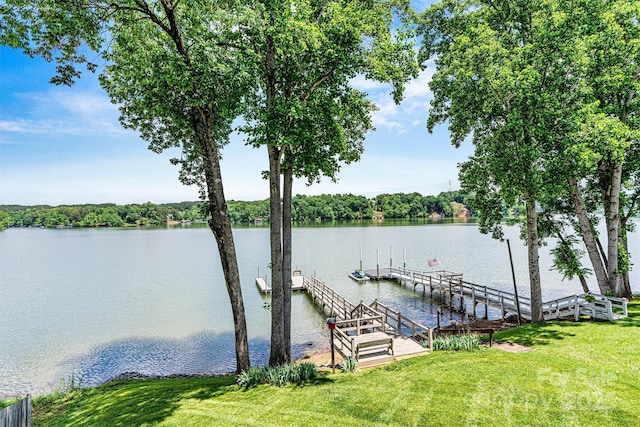 4920 Longfield St, Claremont, NC 28610 - dock area with a water view and a lawn