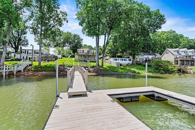 4920 Longfield St, Claremont, NC 28610 - dock area with a water view, a residential view, and a yard