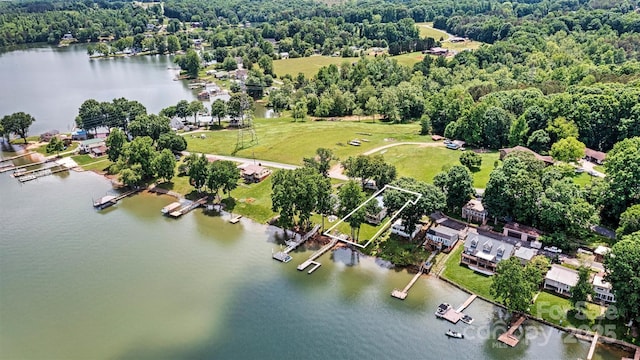 4920 Longfield St, Claremont, NC 28610 - aerial view of property and surrounding area featuring a nearby body of water and property parcel outlined