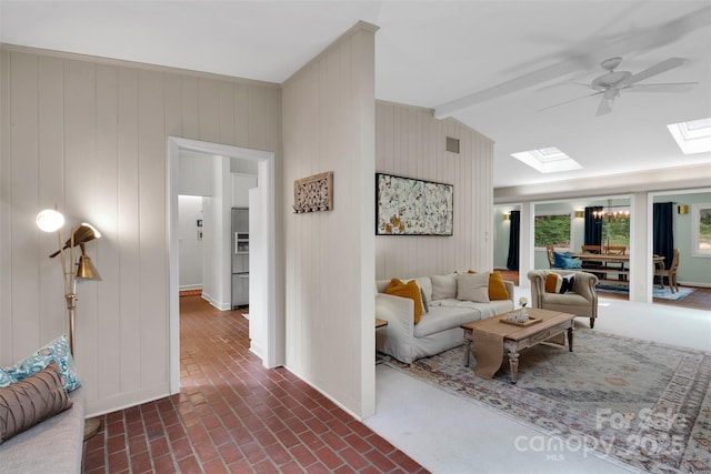 331 Glen Oaks Rd, Charlotte, NC 28270 - living area with a skylight, a ceiling fan, and brick floors