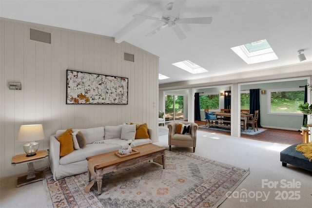 331 Glen Oaks Rd, Charlotte, NC 28270 - living room with a skylight, carpet floors, and ceiling fan