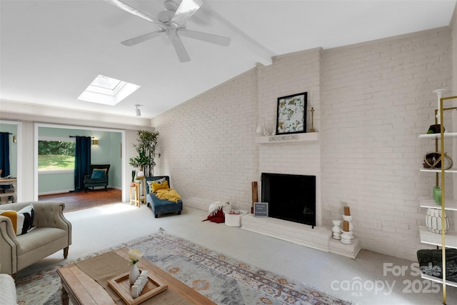 331 Glen Oaks Rd, Charlotte, NC 28270 - carpeted living area with a skylight, brick wall, a fireplace, and a ceiling fan