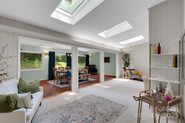 331 Glen Oaks Rd, Charlotte, NC 28270 - living area featuring a skylight, healthy amount of natural light, and vaulted ceiling