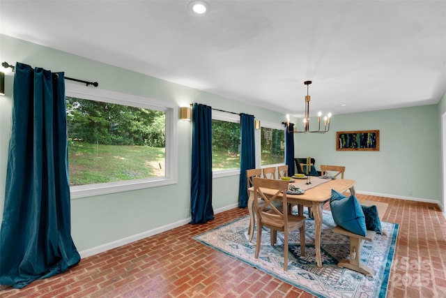 331 Glen Oaks Rd, Charlotte, NC 28270 - dining space with baseboards, a chandelier, brick flooring, and recessed lighting