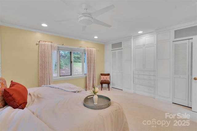 331 Glen Oaks Rd, Charlotte, NC 28270 - bedroom with recessed lighting, ornamental molding, light colored carpet, two closets, and a ceiling fan