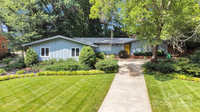 331 Glen Oaks Rd, Charlotte, NC 28270 - single story home with a front yard, board and batten siding, driveway, and a chimney