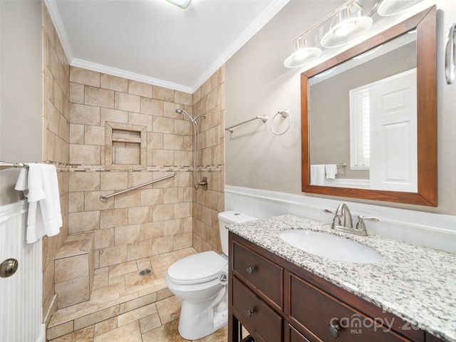 301 Fairway Ln, Spruce Pine, NC 28777 - bathroom with tiled shower, ornamental molding, toilet, vanity, and stone finish floors