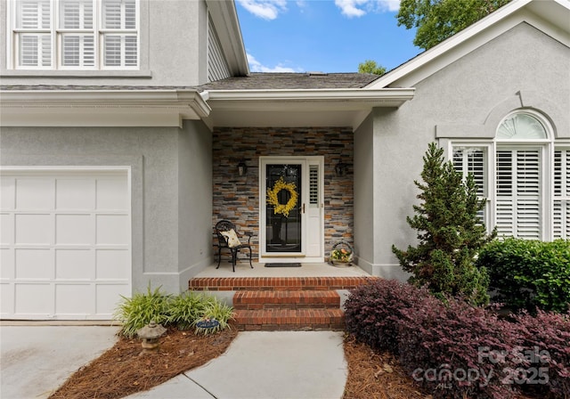 4101 Fairway Downs Ct Unit 9, Charlotte, NC 28277 - entrance to property with stucco siding, stone siding, and covered porch