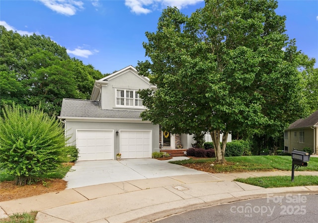 4101 Fairway Downs Ct Unit 9, Charlotte, NC 28277 - view of front of house featuring driveway, a garage, and stucco siding