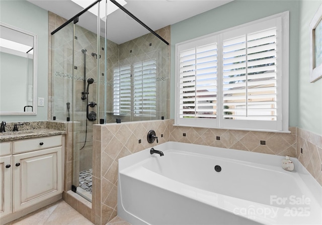 4101 Fairway Downs Ct Unit 9, Charlotte, NC 28277 - full bath featuring a bath, vanity, a stall shower, and tile patterned flooring