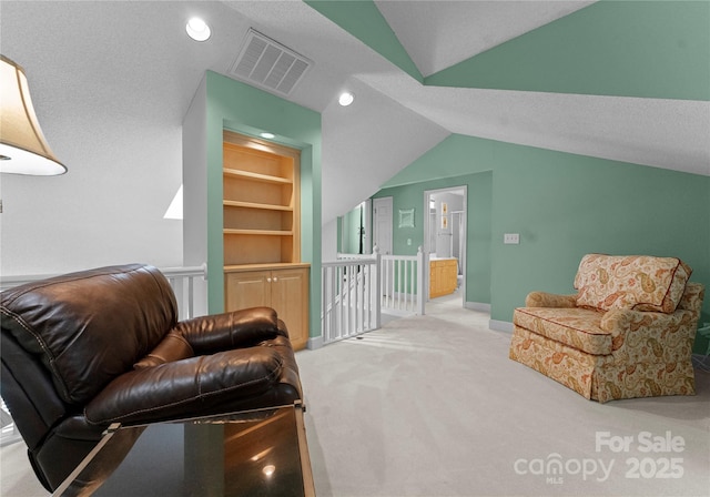4101 Fairway Downs Ct Unit 9, Charlotte, NC 28277 - sitting room with carpet, lofted ceiling, built in shelves, an upstairs landing, and recessed lighting