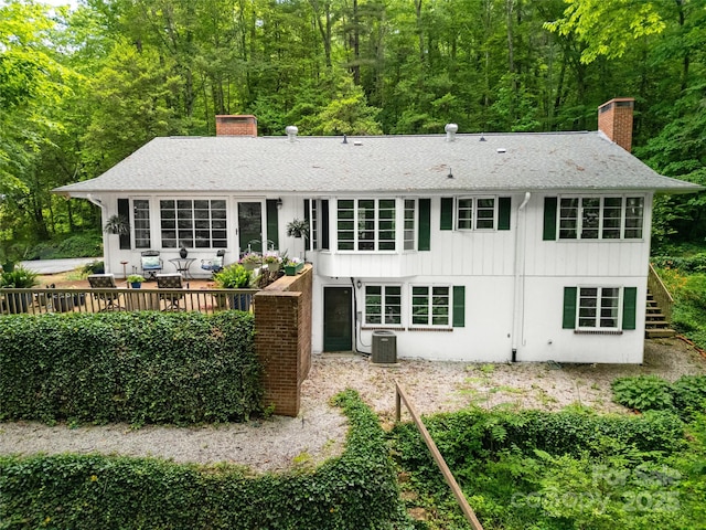 168 River Ridge Rd, Brevard, NC 28712 - back of house with a chimney, stairway, a deck, a shingled roof, and a view of trees