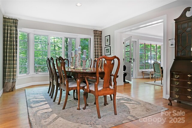 168 River Ridge Rd, Brevard, NC 28712 - dining room with crown molding, plenty of natural light, and wood finished floors