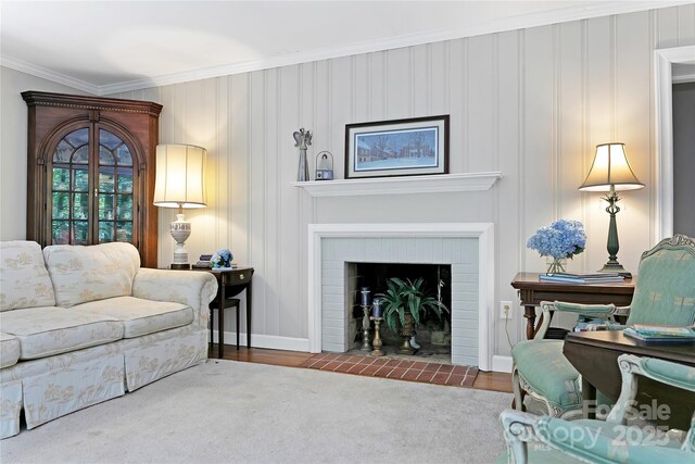 168 River Ridge Rd, Brevard, NC 28712 - living room with a fireplace with flush hearth, ornamental molding, and wood finished floors