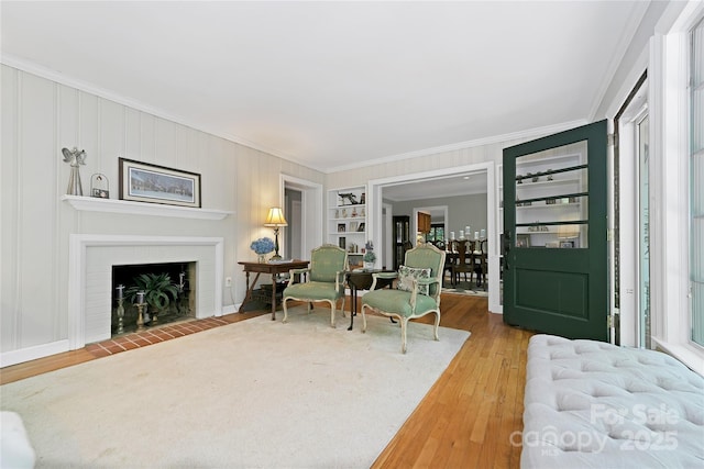 168 River Ridge Rd, Brevard, NC 28712 - foyer featuring ornamental molding, wood finished floors, and a brick fireplace