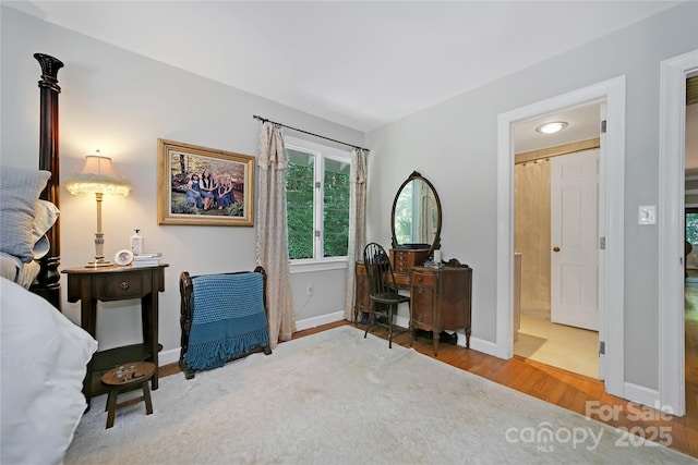 168 River Ridge Rd, Brevard, NC 28712 - bedroom featuring wood finished floors and baseboards