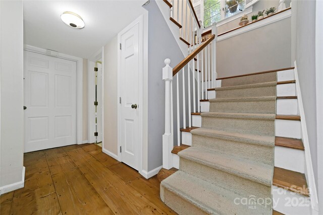 168 River Ridge Rd, Brevard, NC 28712 - staircase featuring wood-type flooring and baseboards