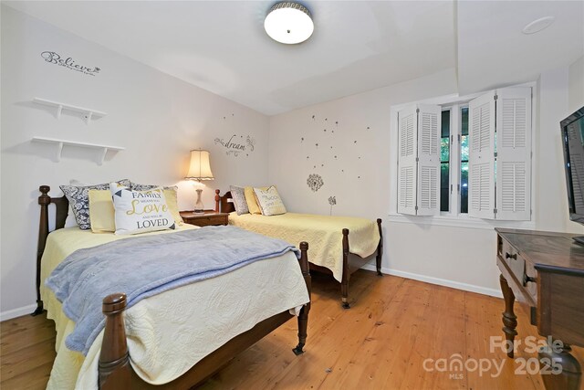 168 River Ridge Rd, Brevard, NC 28712 - bedroom featuring light wood-style floors and baseboards