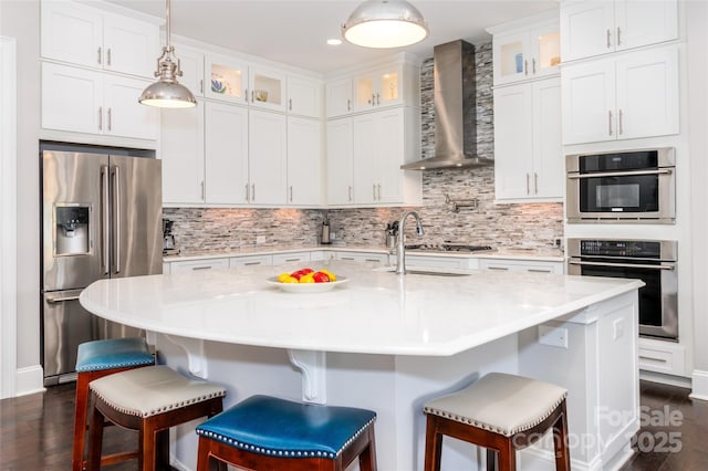 324 Squash Harvest Ct, Matthews, NC 28104 - kitchen featuring stainless steel appliances, wall chimney range hood, dark wood finished floors, white cabinets, and recessed lighting