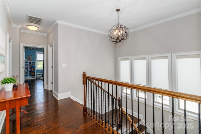 324 Squash Harvest Ct, Matthews, NC 28104 - hall with a chandelier, an upstairs landing, ornamental molding, dark wood-style floors, and baseboards