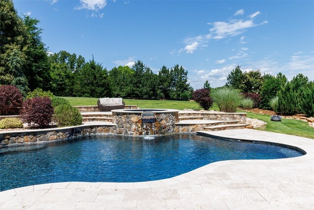 324 Squash Harvest Ct, Matthews, NC 28104 - swimming pool with a lawn and a patio