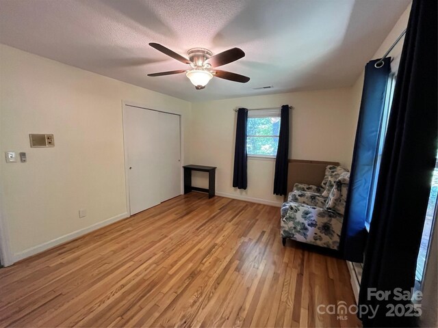 511 Evelyn Ave, Kannapolis, NC 28083 - unfurnished room with light wood-style flooring, ceiling fan, and baseboards