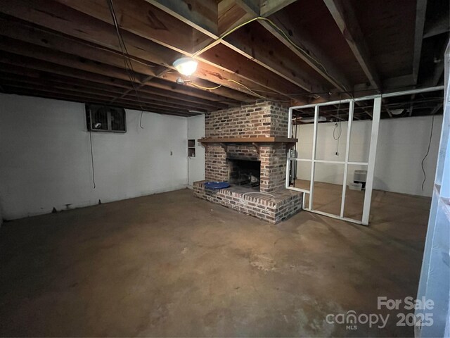 511 Evelyn Ave, Kannapolis, NC 28083 - unfinished below grade area featuring a brick fireplace
