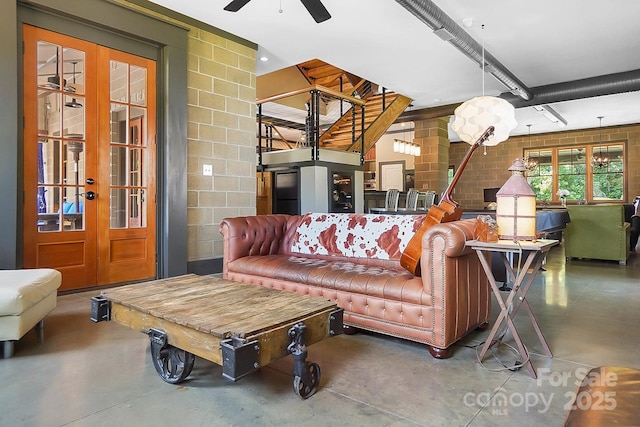 14701 Cabarrus Rd, Mint Hill, NC 28227 - living area with concrete floors and a ceiling fan