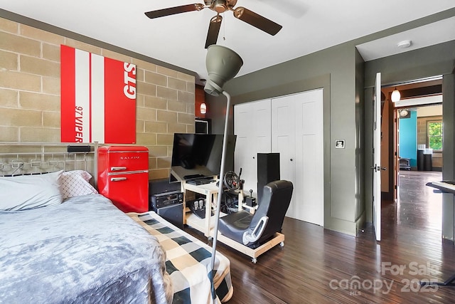 14701 Cabarrus Rd, Mint Hill, NC 28227 - bedroom with wood finished floors, a closet, and a ceiling fan