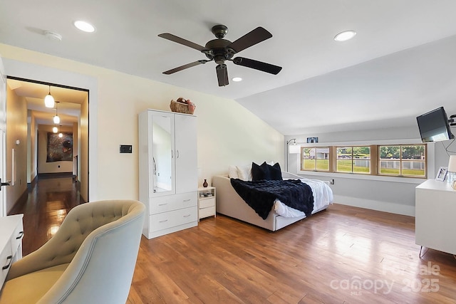 14701 Cabarrus Rd, Mint Hill, NC 28227 - bedroom featuring wood finished floors, vaulted ceiling, recessed lighting, baseboards, and ceiling fan