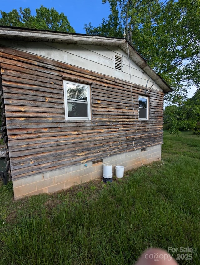 5040 Fairview Church Rd, Lincolnton, NC 28092 - view of side of home featuring crawl space and a lawn
