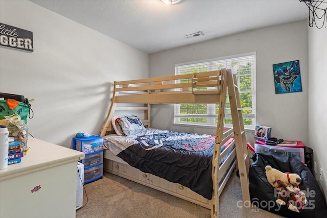 bedroom featuring carpet flooring