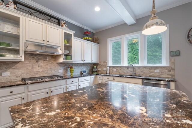 3666 Jacinta Ct, Tega Cay, SC 29708 - kitchen with appliances with stainless steel finishes, a sink, under cabinet range hood, white cabinets, and beam ceiling