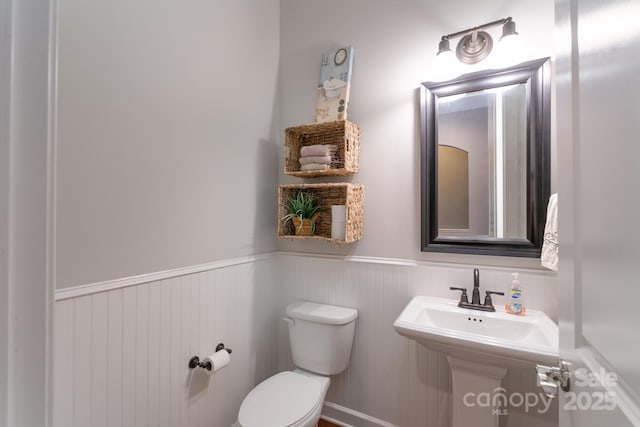3666 Jacinta Ct, Tega Cay, SC 29708 - bathroom featuring toilet and a wainscoted wall
